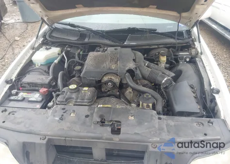 2003 Lincoln Town Car Signature z USA, uszkodzony, nr VIN 1LNHM82W33Y670022